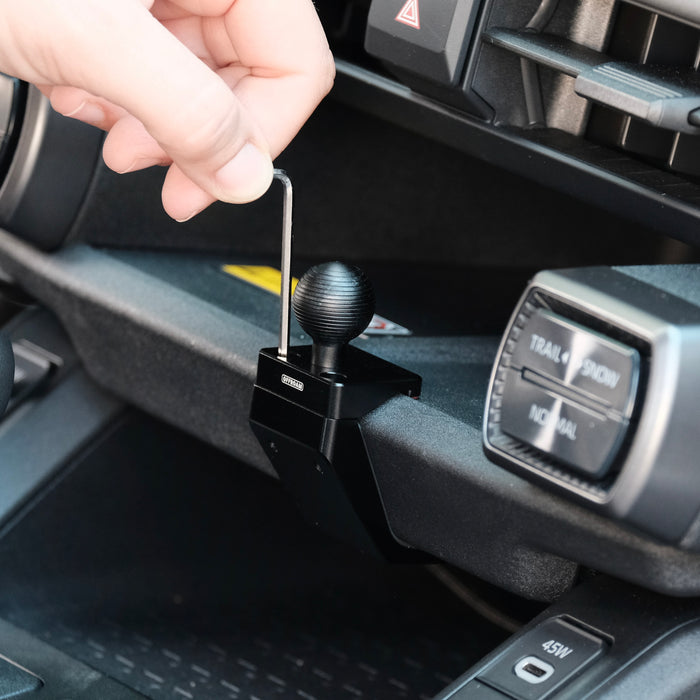 Image of Offroam Mounting Base installation for Toyota RAV4 2026, Center Console. This premium all metal phone mounting base installs easily without drilling or glue. Perfect placement without blocking screens, driver view, or air flow.