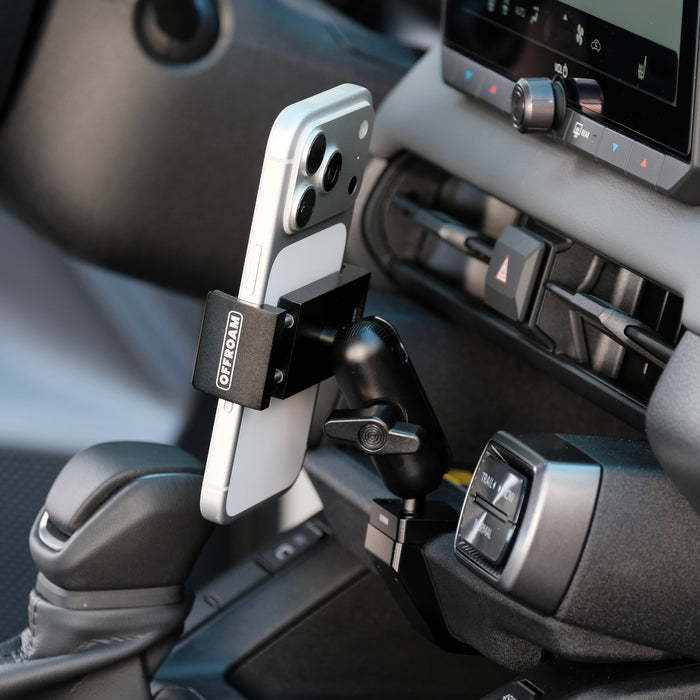 Image of Offroam Phone Mount installed securely in Toyota RAV4 2026. This premium phone mount installs easily without drilling or glue. Spring loaded Universal holder for use with any phone. Perfect placement without blocking screens, driver view, or air flow. Fully adjustable positioning.