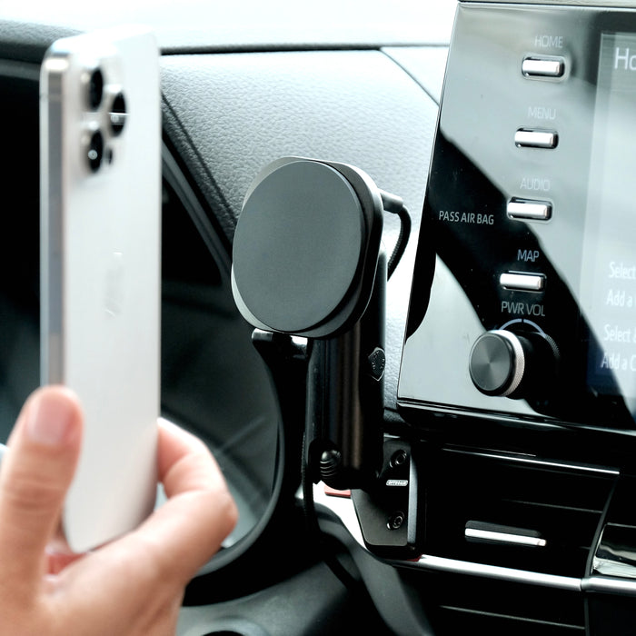 Image of Offroam MagSafe-compatible Phone Mount installed securely in Toyota Sienna 2021-2026. This premium phone mount installs easily without drilling or glue. High force magnets hold phone on any trail, road, or track. Perfect placement without blocking screens, driver view, or air flow. Fully adjustable positioning.