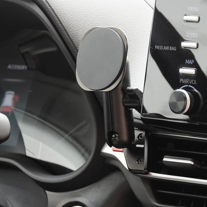 Image of Offroam MagSafe-compatible Phone Mount installed securely in Toyota Sienna 2021-2026. This premium phone mount installs easily without drilling or glue. High force magnets hold phone on any trail, road, or track. Perfect placement without blocking screens, driver view, or air flow. Fully adjustable positioning.