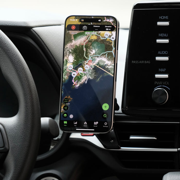 Image of Offroam MagSafe-compatible Phone Mount installed securely in Toyota Sienna 2021-2026. This premium phone mount installs easily without drilling or glue. High force magnets hold phone on any trail, road, or track. Perfect placement without blocking screens, driver view, or air flow. Fully adjustable positioning.