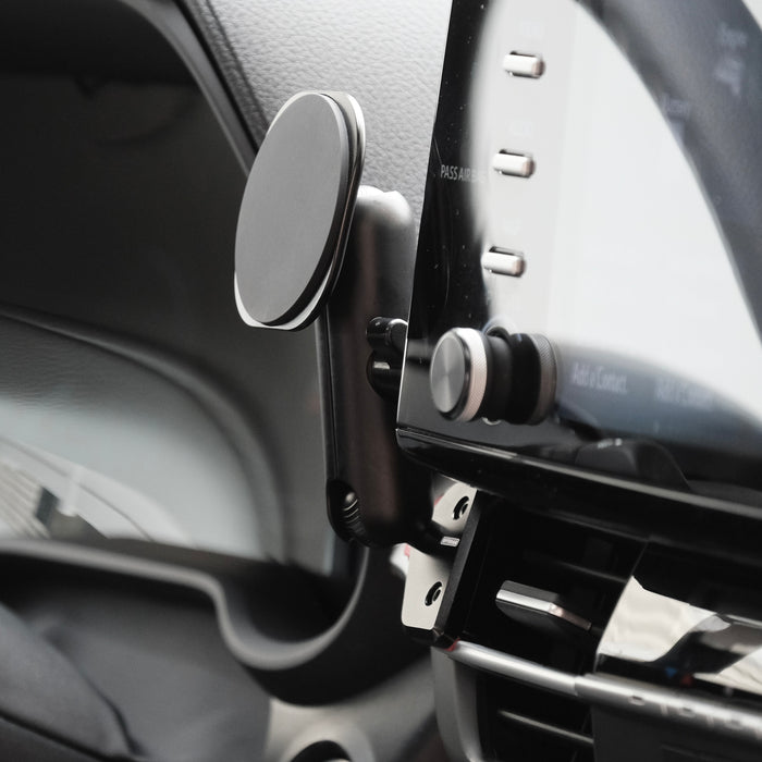 Image of Offroam MagSafe-compatible Phone Mount installed securely in Toyota Sienna 2021-2026. This premium phone mount installs easily without drilling or glue. High force magnets hold phone on any trail, road, or track. Perfect placement without blocking screens, driver view, or air flow. Fully adjustable positioning.