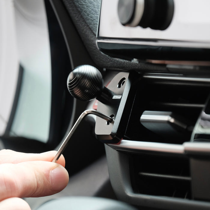 Image of Offroam Mounting Base installed securely in Toyota Sienna 2021-2026. This premium all metal phone mounting base installs easily without drilling or glue. Perfect placement without blocking screens, driver view, or air flow.