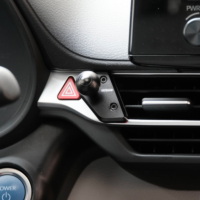 Image of Offroam Mounting Base installed securely in Toyota Sienna 2021-2026. This premium all metal phone mounting base installs easily without drilling or glue. Perfect placement without blocking screens, driver view, or air flow.