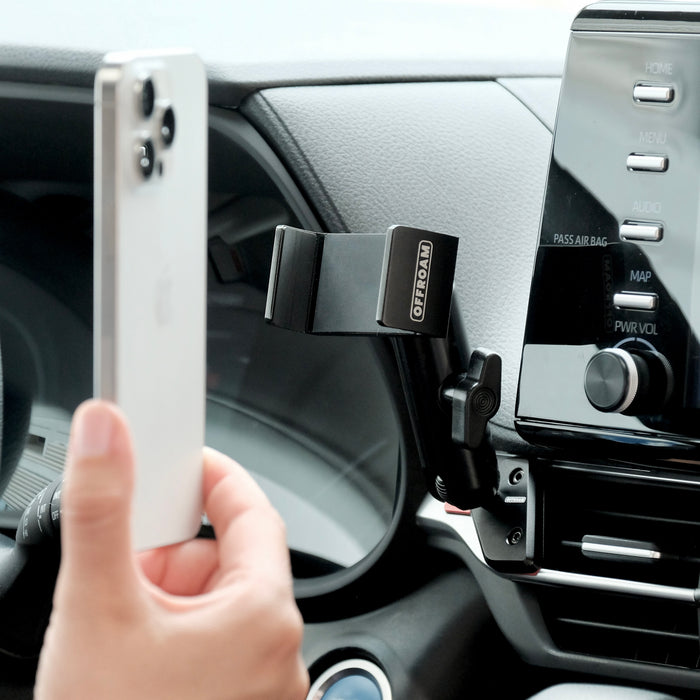 Image of Offroam Phone Mount installed securely in Toyota Sienna 2021-2026. This premium phone mount installs easily without drilling or glue. Spring loaded Universal holder for use with any phone. Perfect placement without blocking screens, driver view, or air flow. Fully adjustable positioning.