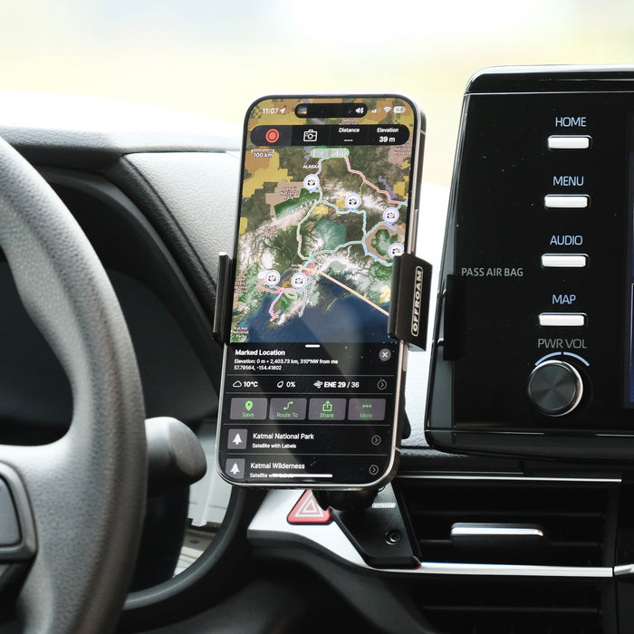 Image of Offroam Phone Mount installed securely in Toyota Sienna 2021-2026. This premium phone mount installs easily without drilling or glue. Spring loaded Universal holder for use with any phone. Perfect placement without blocking screens, driver view, or air flow. Fully adjustable positioning.
