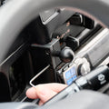 Image of Offroam Mounting Base installed securely in Toyota Tacoma 1996-2004. This premium all metal phone mounting base installs easily without drilling or glue. Perfect placement without blocking screens, driver view, or air flow.