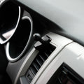 Image of Offroam Mounting Base installed securely in Toyota Tacoma 2005-2011. This premium all metal phone mounting base installs easily without drilling or glue. Perfect placement without blocking screens, driver view, or air flow.