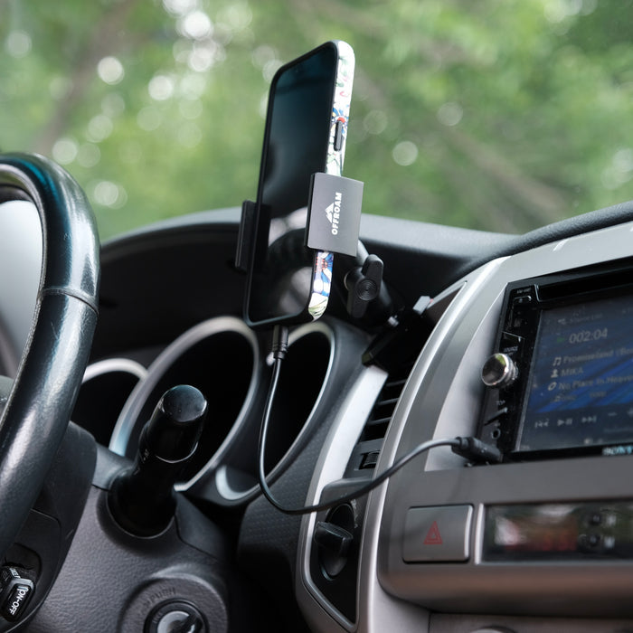Image of Offroam Phone Mount installed securely in Toyota Tacoma 2005-2011. This premium phone mount installs easily without drilling or glue. Spring loaded Universal holder for use with any phone. Perfect placement without blocking screens, driver view, or air flow. Fully adjustable positioning.