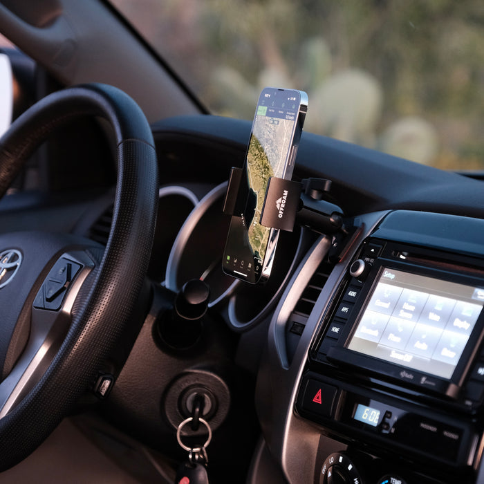 Image of Offroam Phone Mount installed securely in Toyota Tacoma 2012-2015. This premium phone mount installs easily without drilling or glue. Spring loaded Universal holder for use with any phone. Perfect placement without blocking screens, driver view, or air flow. Fully adjustable positioning.