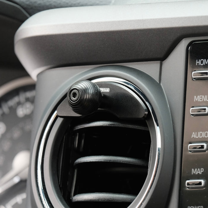 Toyota Tacoma 2016-2023 air vent with Offroam mounting base installed securely. Integrated 20mm ball for accessories mounting like phone, GPS, radio, CB radio
