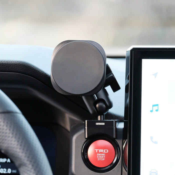Image of Offroam MagSafe-compatible Phone Mount installed securely in Toyota Tacoma 2024-2026 | 4Runner 2025-2026. This premium phone mount installs easily without drilling or glue. High force magnets hold phone on any trail, road, or track. Perfect placement without blocking screens, driver view, or air flow. Fully adjustable positioning.