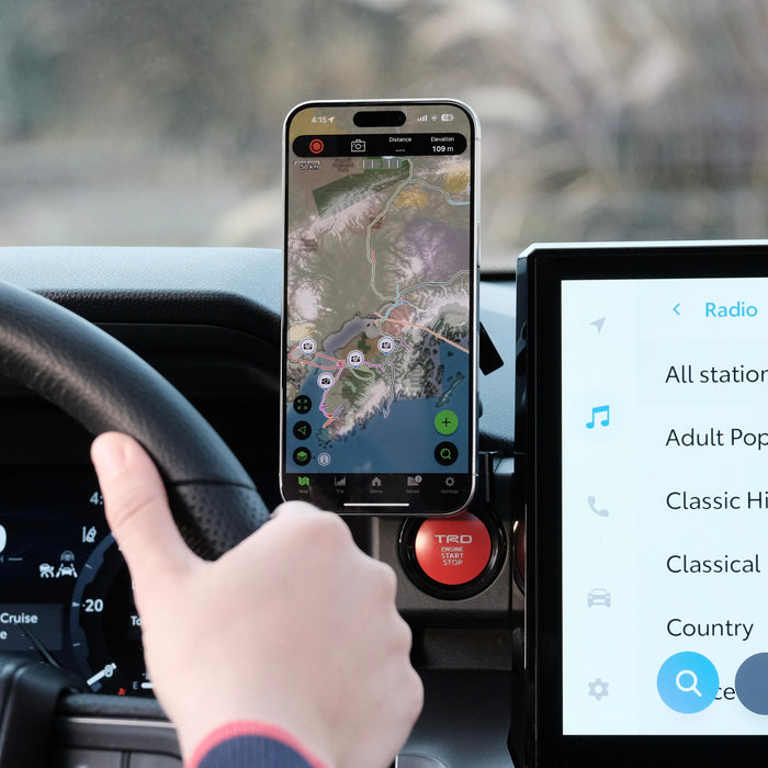 Image of Offroam MagSafe-compatible Phone Mount installed securely in Toyota Tacoma 2024-2026 | 4Runner 2025-2026. This premium phone mount installs easily without drilling or glue. High force magnets hold phone on any trail, road, or track. Perfect placement without blocking screens, driver view, or air flow. Fully adjustable positioning.