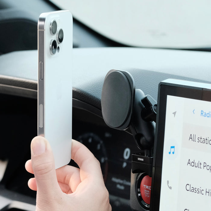 Image of Offroam MagSafe-compatible Phone Mount installed securely in Toyota Tacoma 2024-2026 | 4Runner 2025-2026. This premium phone mount installs easily without drilling or glue. High force magnets hold phone on any trail, road, or track. Perfect placement without blocking screens, driver view, or air flow. Fully adjustable positioning.