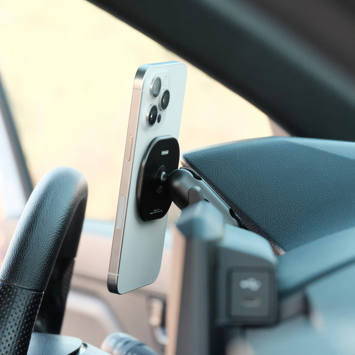 Image of Offroam MagSafe-compatible Phone Mount installed securely in Toyota Tacoma 2024-2026 | 4Runner 2025-2026. This premium phone mount installs easily without drilling or glue. High force magnets hold phone on any trail, road, or track. Perfect placement without blocking screens, driver view, or air flow. Fully adjustable positioning.