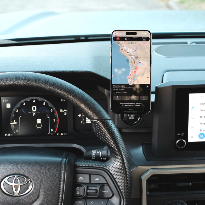 Image of Offroam MagSafe-compatible Phone Mount installed securely in Toyota Tacoma 2024-2026 | 4Runner 2025-2026. This premium phone mount installs easily without drilling or glue. High force magnets hold phone on any trail, road, or track. Perfect placement without blocking screens, driver view, or air flow. Fully adjustable positioning.