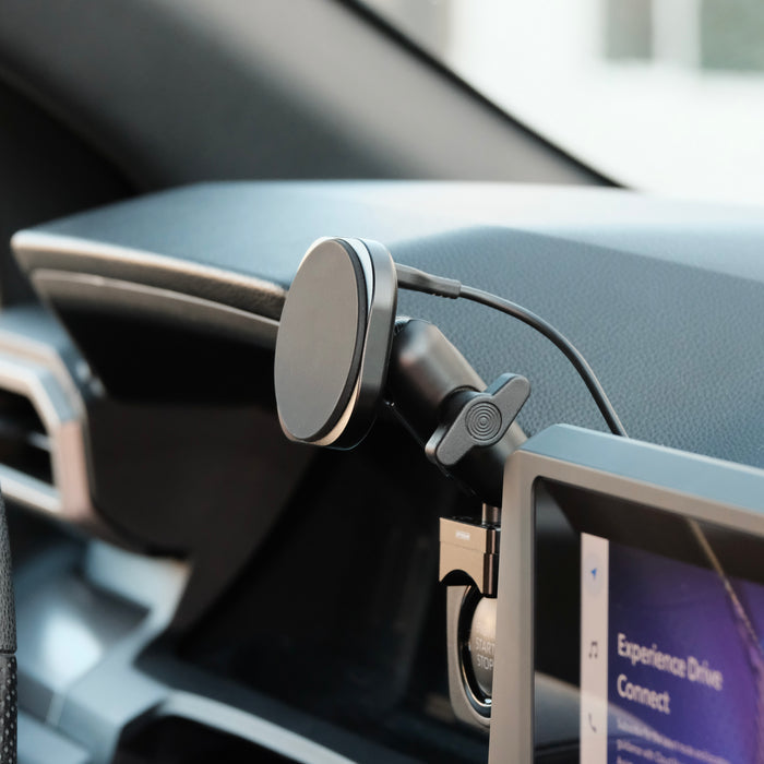 Image of Offroam MagSafe-compatible Phone Mount installed securely in Toyota Tacoma 2024-2026 | 4Runner 2025-2026. This premium phone mount installs easily without drilling or glue. High force magnets hold phone on any trail, road, or track. Perfect placement without blocking screens, driver view, or air flow. Fully adjustable positioning.