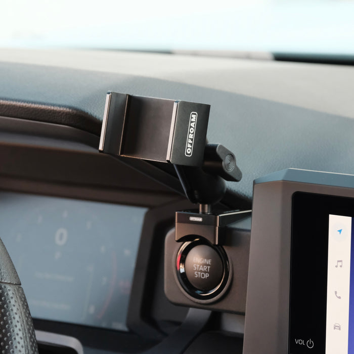 Image of Offroam Phone Mount installed securely in Toyota Tacoma 2024-2026 | 4Runner 2025-2026. This premium phone mount installs easily without drilling or glue. Spring loaded Universal holder for use with any phone. Perfect placement without blocking screens, driver view, or air flow. Fully adjustable positioning.