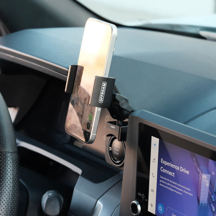 Image of Offroam Phone Mount installed securely in Toyota Tacoma 2024-2026 | 4Runner 2025-2026. This premium phone mount installs easily without drilling or glue. Spring loaded Universal holder for use with any phone. Perfect placement without blocking screens, driver view, or air flow. Fully adjustable positioning.