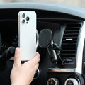 Image of Offroam MagSafe-compatible Phone Mount installed securely in Toyota Tundra 2007-2013 | Sequoia 2008-2022. This premium phone mount installs easily without drilling or glue. High force magnets hold phone on any trail, road, or track. Perfect placement without blocking screens, driver view, or air flow. Fully adjustable positioning.