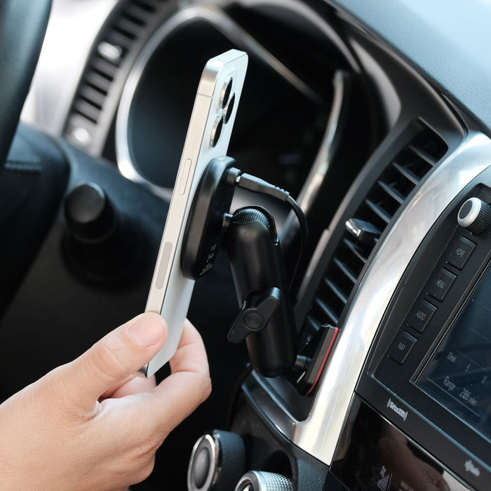 Image of Offroam MagSafe-compatible Phone Mount installed securely in Toyota Tundra 2007-2013 | Sequoia 2008-2022. This premium phone mount installs easily without drilling or glue. High force magnets hold phone on any trail, road, or track. Perfect placement without blocking screens, driver view, or air flow. Fully adjustable positioning.
