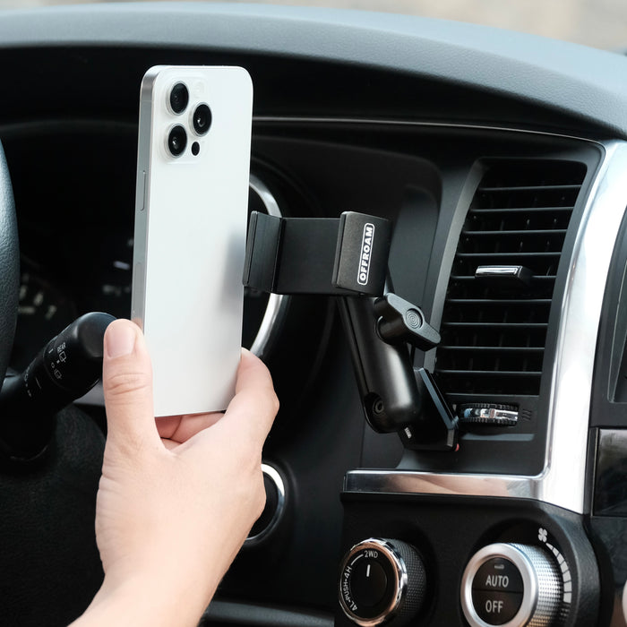 Image of Offroam Phone Mount installed securely in Toyota Tundra 2007-2013 | Sequoia 2008-2022. This premium phone mount installs easily without drilling or glue. Spring loaded Universal holder for use with any phone. Perfect placement without blocking screens, driver view, or air flow. Fully adjustable positioning.