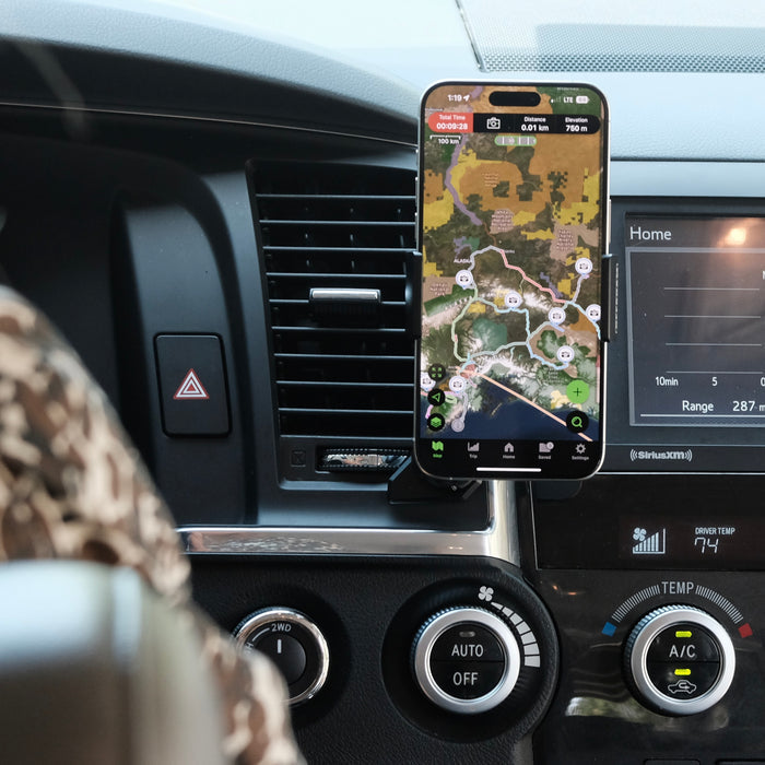 Image of Offroam Phone Mount installed securely in Toyota Tundra 2007-2013 | Sequoia 2008-2022. This premium phone mount installs easily without drilling or glue. Spring loaded Universal holder for use with any phone. Perfect placement without blocking screens, driver view, or air flow. Fully adjustable positioning.