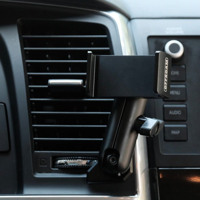 Image of Offroam Phone Mount installed securely in Toyota Tundra 2007-2013 | Sequoia 2008-2022. This premium phone mount installs easily without drilling or glue. Spring loaded Universal holder for use with any phone. Perfect placement without blocking screens, driver view, or air flow. Fully adjustable positioning.