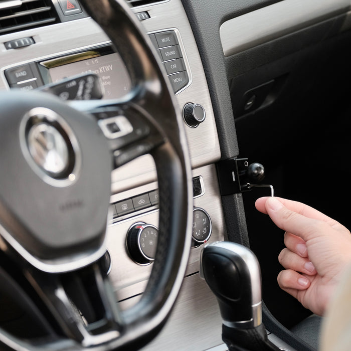 Image of Offroam Mounting Base installed securely in Volkswagen Golf 2015-2021. This premium all metal phone mounting base installs easily without drilling or glue. Perfect placement without blocking screens, driver view, or air flow.