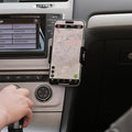 Image of Offroam Phone Mount installed securely in Volkswagen Golf 2015-2021. This premium phone mount installs easily without drilling or glue. Spring loaded Universal holder for use with any phone. Perfect placement without blocking screens, driver view, or air flow. Fully adjustable positioning.
