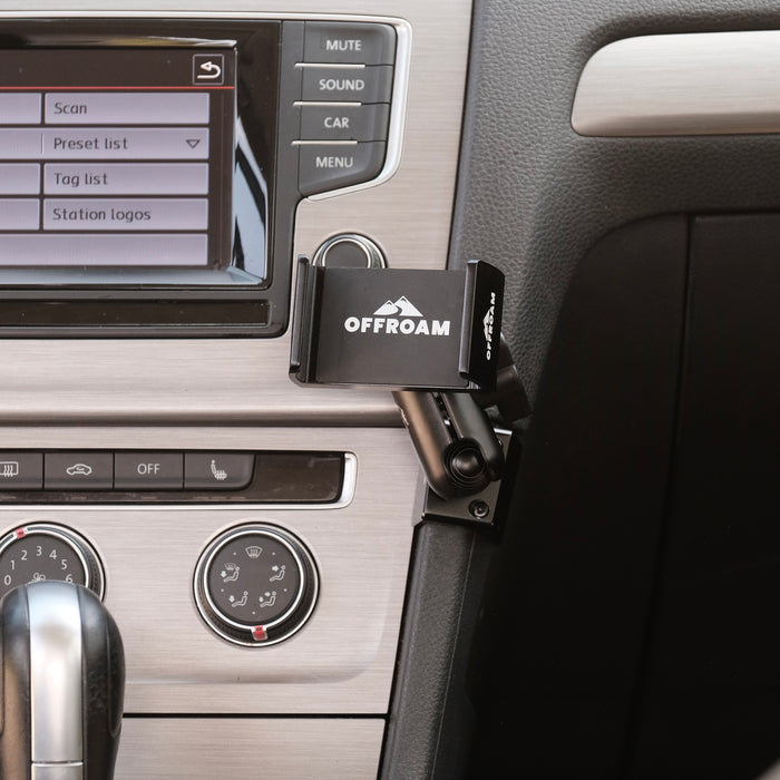 Image of Offroam Phone Mount installed securely in Volkswagen Golf 2015-2021. This premium phone mount installs easily without drilling or glue. Spring loaded Universal holder for use with any phone. Perfect placement without blocking screens, driver view, or air flow. Fully adjustable positioning.