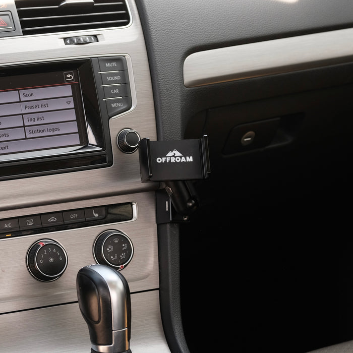 Image of Offroam Phone Mount installed securely in Volkswagen Golf 2015-2021. This premium phone mount installs easily without drilling or glue. Spring loaded Universal holder for use with any phone. Perfect placement without blocking screens, driver view, or air flow. Fully adjustable positioning.
