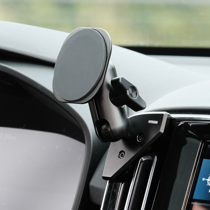 Image of Offroam MagSafe-compatible Phone Mount installed securely in Volvo XC40 2018-2026. This premium phone mount installs easily without drilling or glue. High force magnets hold phone on any trail, road, or track. Perfect placement without blocking screens, driver view, or air flow. Fully adjustable positioning.