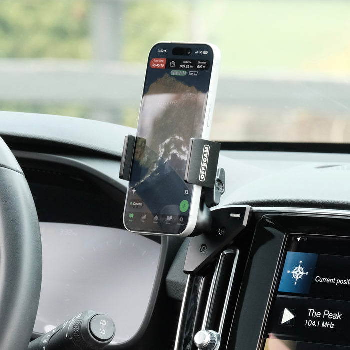 Image of Offroam Phone Mount installed securely in Volvo XC40 2018-2026. This premium phone mount installs easily without drilling or glue. Spring loaded Universal holder for use with any phone. Perfect placement without blocking screens, driver view, or air flow. Fully adjustable positioning.