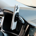 Offroam non-charging magsafe phone mount installed on Volvo XC60 2018-2026 models. Shown holding iPhone securely with MagSafe magnets and articulating arm.