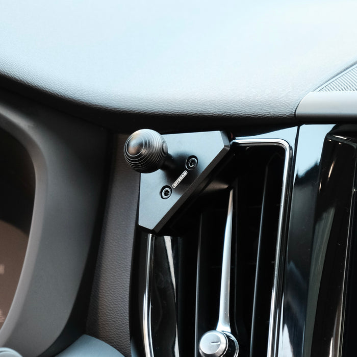 Offroam mounting base with 20mm ball shown installed on Volvo XC60 2018-2026  models. Does not block air flow and holds securely without glue or drilling.