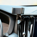 Offroam universal phone mont installed on  Volvo XC60 2018-2026. Does not block air flow and holds securely without glue or drilling. Secure mechanical holder for one-hand use and off-roading.