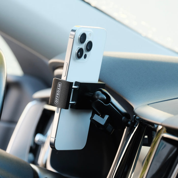 Offroam universal phone mont installed on  Volvo XC60 2018-2026. Shown from the back with springs extended. Shown holding iPhone securely.